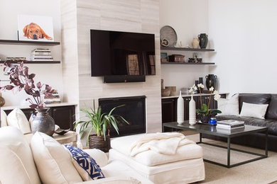 Living room - mid-sized transitional open concept medium tone wood floor and brown floor living room idea in San Diego with white walls, a standard fireplace, a tile fireplace and a wall-mounted tv