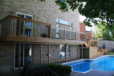 Small minimalist backyard deck photo in Toronto with no cover