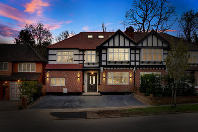 This is an example of a medium sized modern house exterior in London.