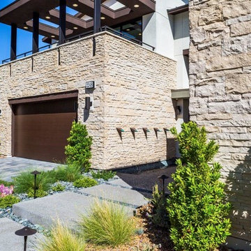 Angular Contemporary Facade With Natural Looking Stone
