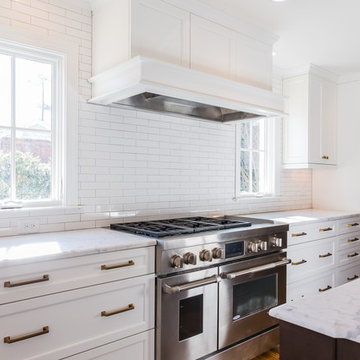 White, gold, and marble kitchen