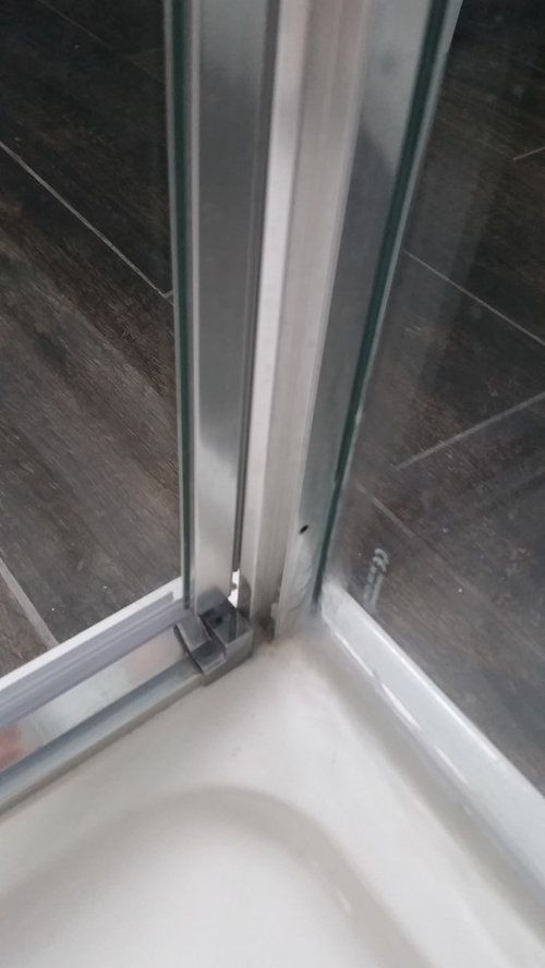 Newly Installed Frameless Shower Door Leak The Door Does Not Correctly Meet Bottom Of Frame And Causes Shower To Leak Every Time Anyone Have Any Wisdom How Fix This