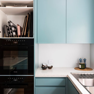 Kitchen with Satin Gould Blue Cabinets