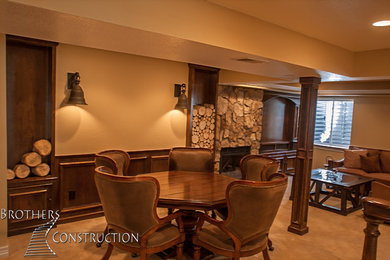 Example of a mid-sized classic underground carpeted basement design in Denver with beige walls and a standard fireplace