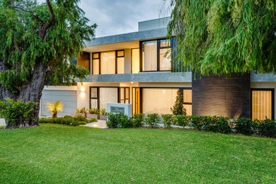 This is an example of a large contemporary house exterior in Perth.