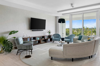 Trendy wallpaper living room photo in Miami with a wall-mounted tv