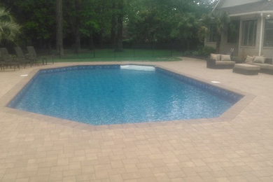 Inspiration for a transitional pool remodel in Other
