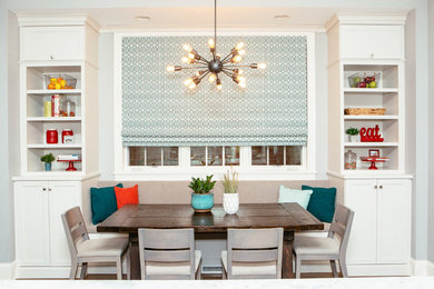 Example of a transitional dining room design in Chicago with gray walls