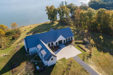 Example of a cottage exterior home design in Baltimore