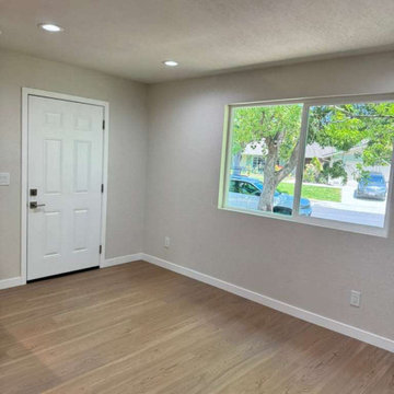 Bright Primary Suite with Wood-Look Flooring