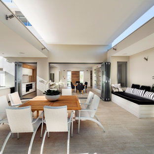 Mid-sized contemporary backyard patio in Perth with an outdoor kitchen and a roof extension.