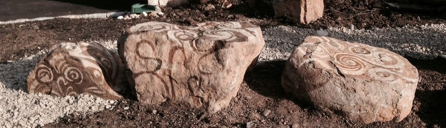 Stone Landscape feature created along a garden path- in progress