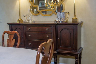 Mid-sized elegant carpeted dining room photo in Chicago with beige walls and no fireplace