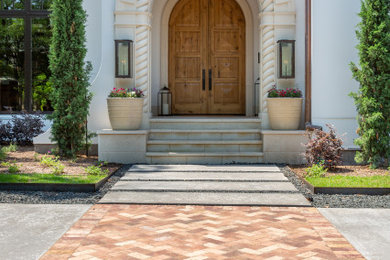 Inspiration for a mediterranean entryway remodel in Dallas