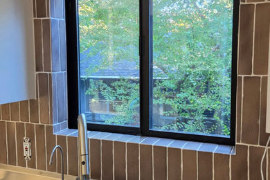Laundry room - traditional laundry room idea in Portland