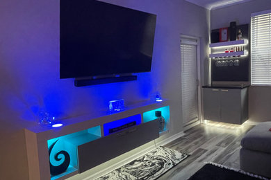 Family room - modern family room idea in Miami