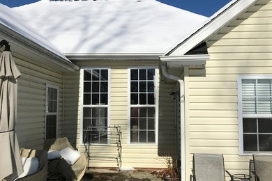 Example of a sunroom design in Other