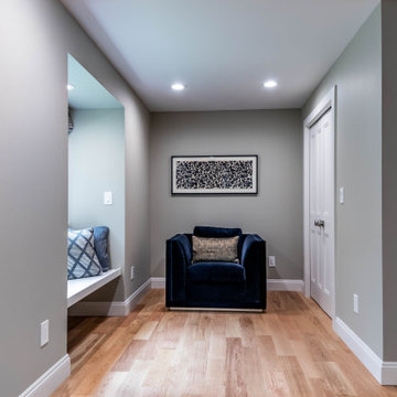 Spacious Gray Bedroom with Seating Area