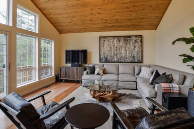 Example of a mid-sized transitional family room design in Toronto