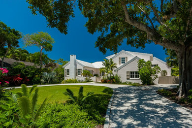 Beach style home design photo in Miami