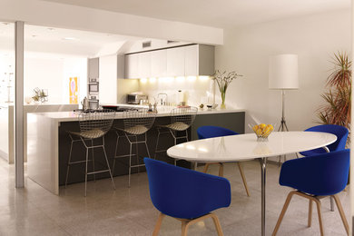 Example of a trendy dining room design in Los Angeles with white walls