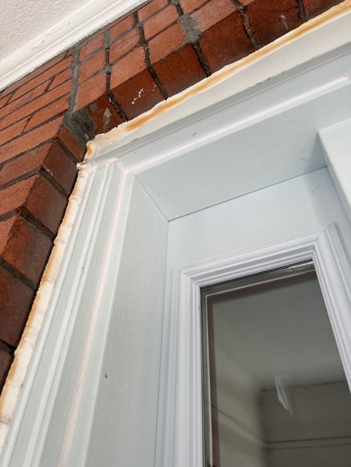 Caulking around exterior door is yellow