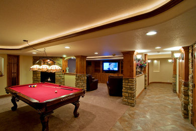 Inspiration for a huge rustic walk-out carpeted basement remodel in Providence with yellow walls, a standard fireplace and a stone fireplace