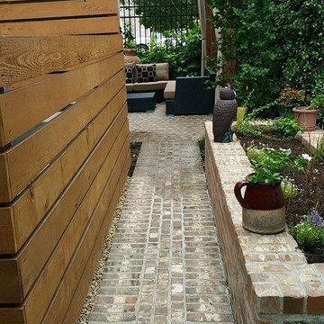 High function in a small side yard! Pergola, patio, raised bed, fountain, etc.
