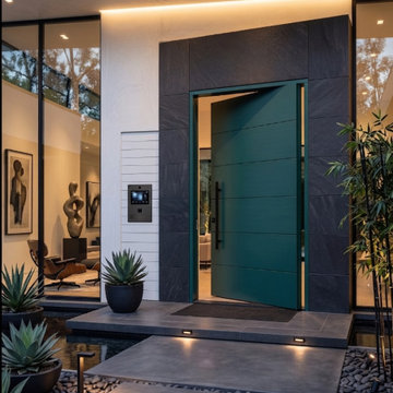Modern Green Entry Door for a Zen-Inspired Home