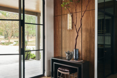 Example of a transitional entryway design in Dallas
