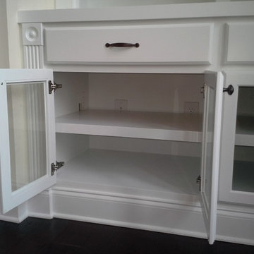 Fireplace Built-in with glass shelves and doors