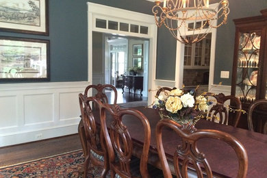 Large transitional dining room in DC Metro with blue walls.