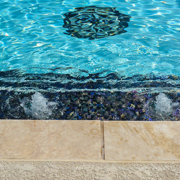 Grecian swimming pool with L, diving board and hot tub