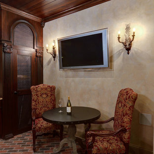 Photo of a large classic basement in Atlanta with brick flooring.