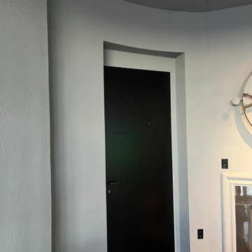 Premium Secret & Sliding Barausse doors, Vives Concrete look tiles and Kohler
