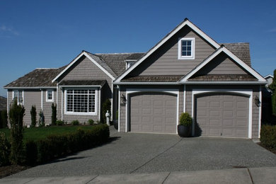 Mid-sized trendy gray one-story wood exterior home photo in Seattle