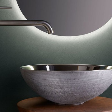 Brest silver porcelain vessel sink.