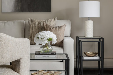 Example of a large transitional formal and open concept dark wood floor and brown floor living room design in New York with beige walls and no tv