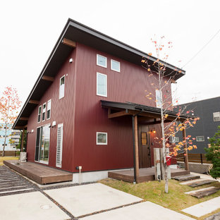 他の地域のインダストリアルスタイルのおしゃれな家の外観 (赤い外壁、片流れ屋根、戸建) の写真