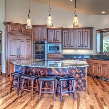 Carnival Granite Island with Verde Peacock Granite