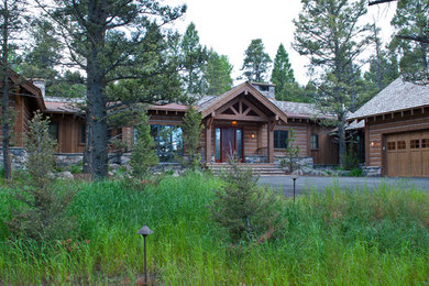 Mountain style brown wood gable roof photo in Other