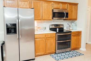 Example of a transitional kitchen design in Other
