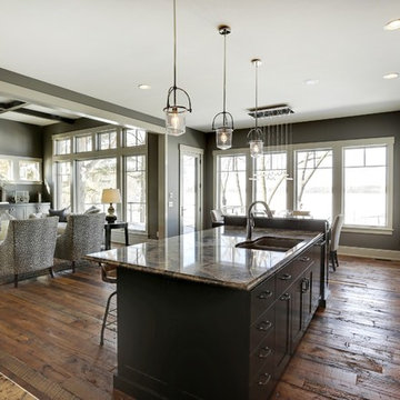 Weathered Antique Flooring in a Modern Open Kitchen and Living Room