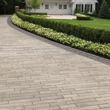 Traditional Curved Driveway with a Sophisticated Inlay Design