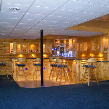 Log Siding & Knotty Pine Paneling Basement Remodel