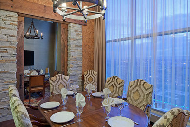 Transitional dining room in Denver.