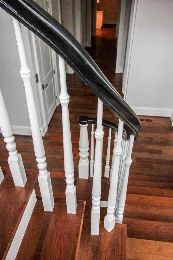 Powerful Impression by Floating Staircase in Suburban Foyer