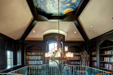Huge elegant loft-style dark wood floor living room library photo in Austin with brown walls, no fireplace and no tv