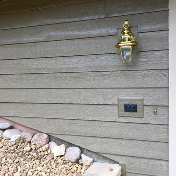 Diamond Kote siding, aluminum Dark bronze soffit and gutters