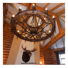 Wrought iron chandelier wagon wheel style. Aged pine, metall.